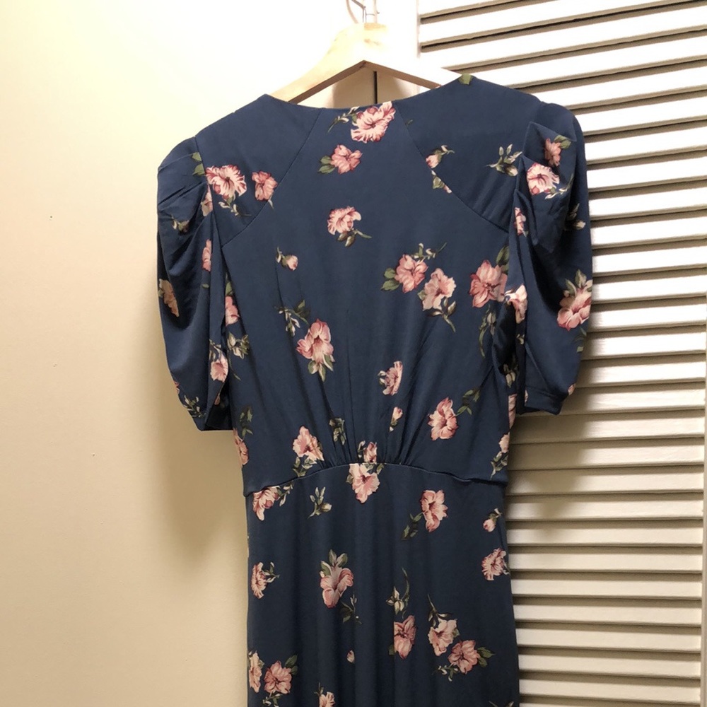 V-neck floral midi dress with ruched sleeves. New with tag.